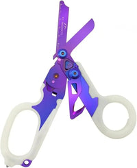 Purple-bladed luminous trauma shears with light-colored handles